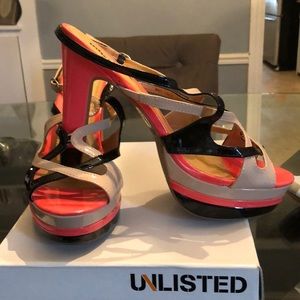 Unlisted coral, tan and black